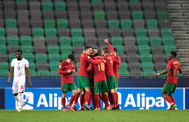 Dany Mota of Portugal celebrates with team mates after scoring their side's first goal during the 2021 UEFA European Under-21 Championship Group D...