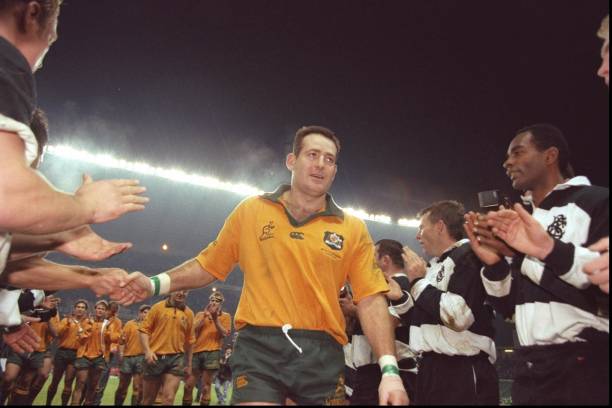 7 Dec 1996: David Campese of Australia leaves the field after his final match, during the Australian tour match against the Barbarians at Twickenham in Middlesex. Australia won 12-39. Mandatory Credit: Ross Kinnaird/Allsport