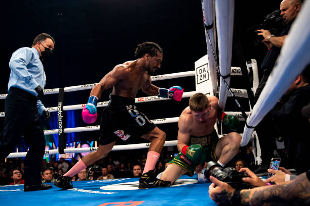 Demetrius Andrade knocks out Jason Quigley in the second round during the WBO middleweight title bout at SNHU Arena on November 19, 2021 in...