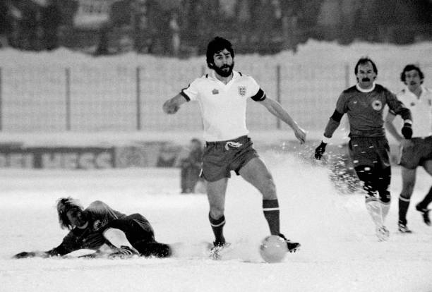 Dennis Mortimer in action for the England B team against West Germany B in the friendly International played on a snow covered pitch in Augsburg,...
