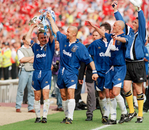Dennis Wise and Gianluca Vialli of Chelsea celebrate with the trophy on the lap of honour after the FA Cup Final between Chelsea and Middlesbrough at...