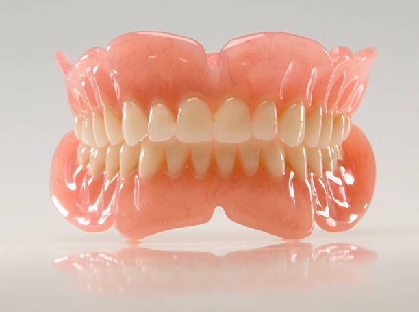 dental plate - dentures stock pictures, royalty-free photos & images