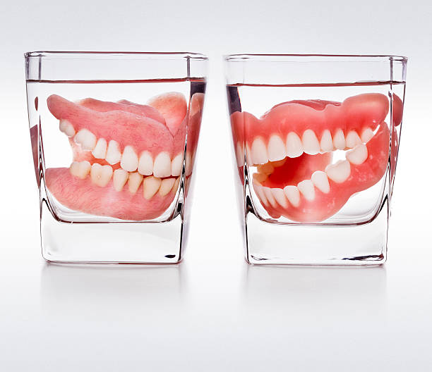 Melrose MA dentures in a glass of water