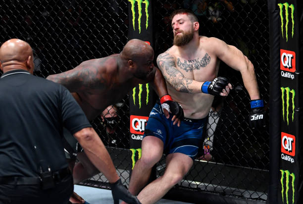 Derrick Lewis knocks out Chris Daukaus in their heavyweight fight during the UFC Fight Night event at UFC APEX on December 18, 2021 in Las Vegas,...