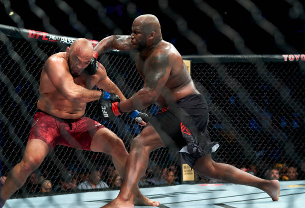 Derrick Lewis punches Ilir Latifi of Sweden during the UFC 247 event at Toyota Center on February 08, 2020 in Houston, Texas.