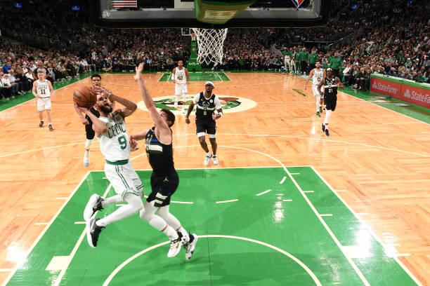 Derrick White of the Boston Celtics drives to the basket against the Milwaukee Bucks during Game 5 of the 2022 NBA Playoffs Eastern Conference...