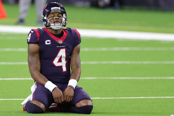 Deshaun Watson of the Houston Texans reacts to a play during a game against the Tennessee Titans at NRG Stadium on January 03, 2021 in Houston, Texas.