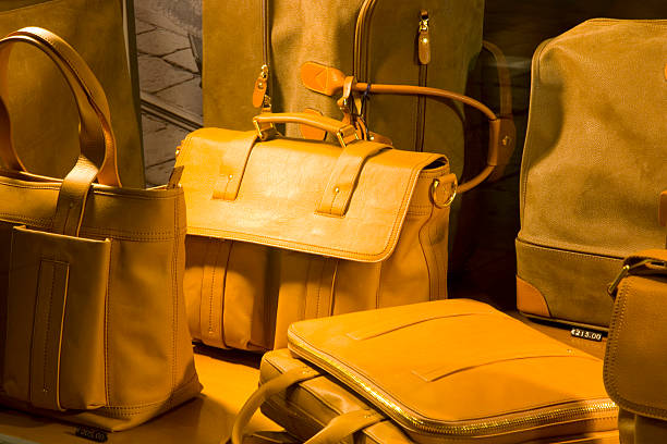 designer leather bags on display in window of store on via mazzini picture