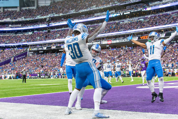 Detroit Lions Running Back Jamaal Williams celebrates a touchdown during the NFL game between the Detroit Lions and the Minnesota Vikings on...