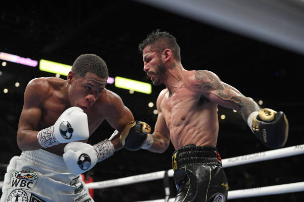 Devin Haney and Jorge Linares battle during their WBC lightweight title fight at Michelob ULTRA Arena on May 29, 2021 in Las Vegas, Nevada. Haney won...