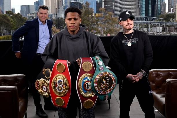 Devin Haney of the US holds his title belts after a face-off with Australia's George Kambosos in Melbourne on October 11 ahead of their rematch for...