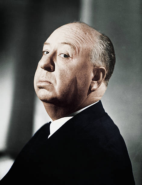 Director Alfred Hitchcock in a typical pose. Undated Photo.