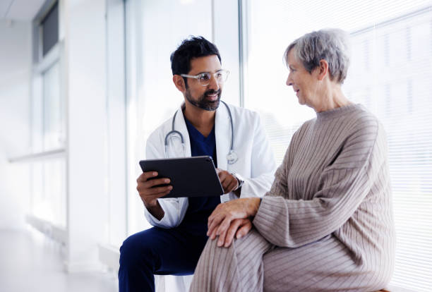 doctor and patient in conversation looking at digital tablet picture id1365582872?k=20&m=1365582872&s=612x612&w=0&h=Iw4c4vawUrIRzCu043fmWknCxRSpa5Ma2b8 ysZzqNA= - Illnesses, Causes, and Their Cures.