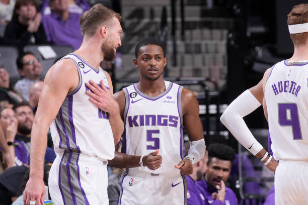 Domantas Sabonis and De'Aaron Fox of the Sacramento Kings talk during the game against the Portland Trail Blazers on October 9, 2022 at Golden 1...
