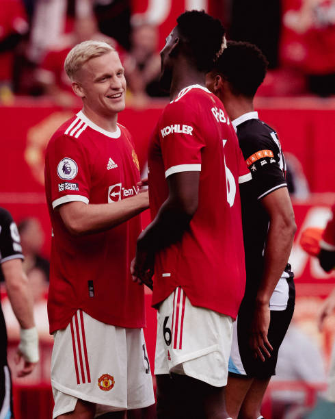 Donny van de Beek and Paul Pogba of Manchester United walks off after the Premier League match between Manchester United and Newcastle United at Old...