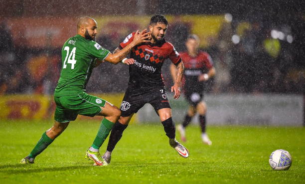Dublin , Ireland - 21 October 2022; Declan McDaid of Bohemians in action against Ethan Boyle of Finn Harps during the SSE Airtricity League Premier...