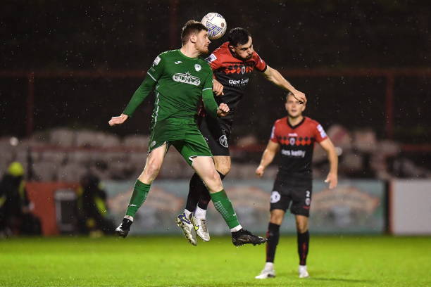 Dublin , Ireland - 21 October 2022; Rob Jones of Finn Harps in action against Jordan Flores of Bohemians during the SSE Airtricity League Premier...