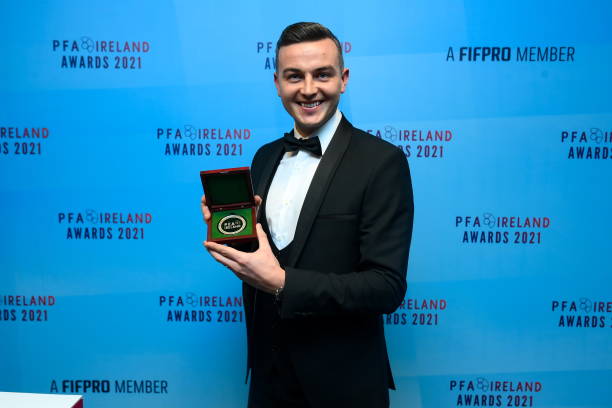 Dublin , Ireland - 3 December 2021; Marc Ludden of Treaty United with his team of the year award during the PFA Ireland Awards at The Marker Hotel in...