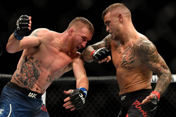 Dustin Poirier throws an elbow at Justin Gaethje in their lightweight fight during the UFC Fight Night event at Gila River Arena on April 14, 2018 in...