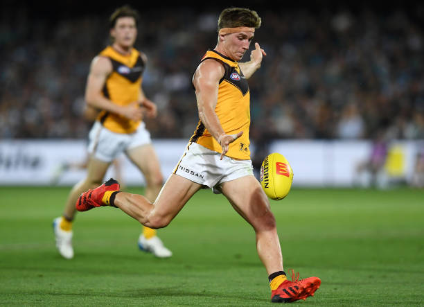 Dylan Moore of the Hawks kicks for goal during the round two AFL match between the Port Adelaide Power and the Hawthorn Hawks at Adelaide Oval on...