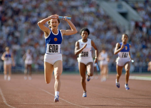 https://media.gettyimages.com/photos/east-german-athlete-marlies-gohr-crosses-the-finish-line-in-first-to-picture-id709872843?k=6&m=709872843&s=612x612&w=0&h=tfBoIm3GZTY3xwBxnXyUA0L5aGK2WlrC8P--ppnKi40=