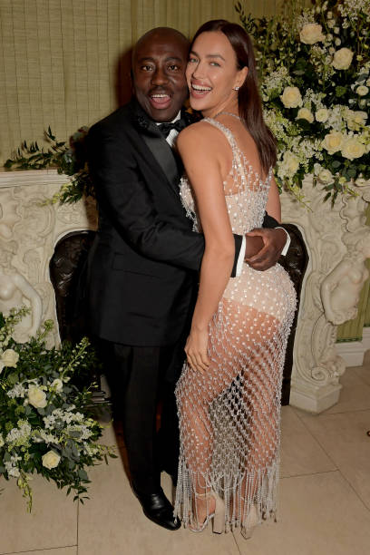 Edward Enninful and Irina Shayk attend the British Vogue and Tiffany Co Fashion and Film Party at Annabel's on February 2 2020 in London England