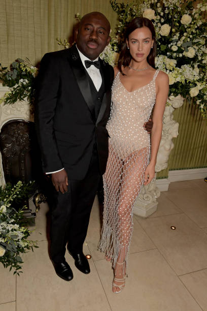 Edward Enninful and Irina Shayk attend the British Vogue and Tiffany Co Fashion and Film Party at Annabel's on February 2 2020 in London England