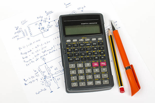 Electronics design concept calculator and pens.