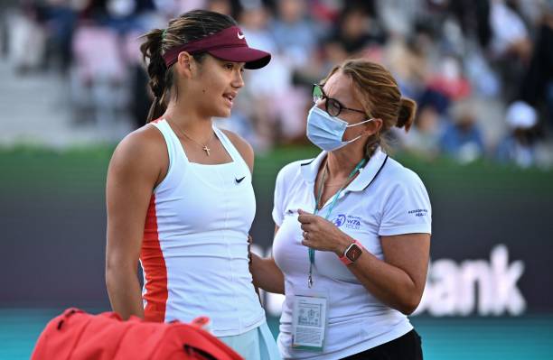 Emma Raducanu of Britain receives medical check-up during a women's singles semifinal match with Jelena Ostapenko of Latvia at the Korea Open tennis...