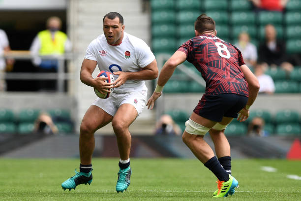 England's prop Ellis Genge (L) is closed down by US number 8 Cam Dolan (R) during the international friendly rugby union match between England and United States at Twickenham, south-west London on July 4, 2021. (Photo by DANIEL LEAL-OLIVAS / AFP) (Photo by DANIEL LEAL-OLIVAS/AFP via Getty Images)