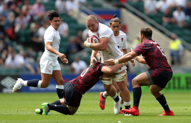 England's Sam Underhill is tackled by USA's Luke Carty during the Summer Series match at Twickenham Stadium, London. Picture date: Sunday July 4, 2021. (Photo by David Davies/PA Images via Getty Images)