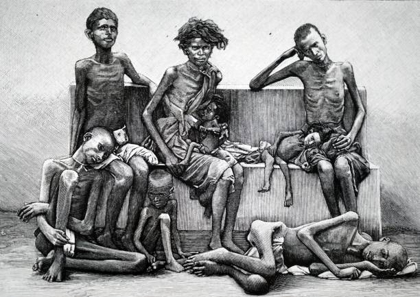 Engraving depicting famine in India: starving people in a government relief camp.