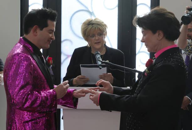 NV: Las Vegas Mayor Officiates LGBTQ Commitment Ceremony For Entertainer Frank Marino And Alex Schechter