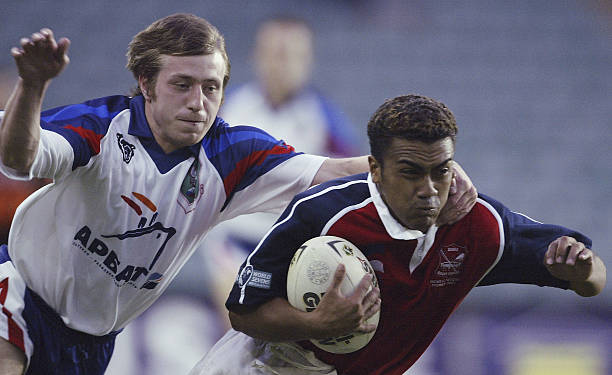 evgeny-bojoukov-of-russia-tackles-eti-vaalele-of-samoa-high-during-picture-id2896345