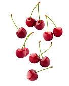 Falling cherry, clipping path, isolated on white background, full depth of field
