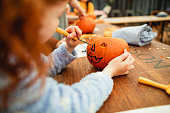 Family Carving Pumpkins