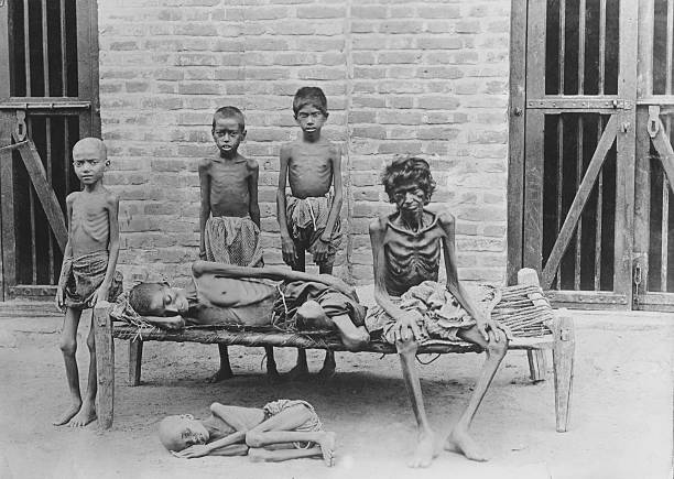 Famine in India. A starving family.