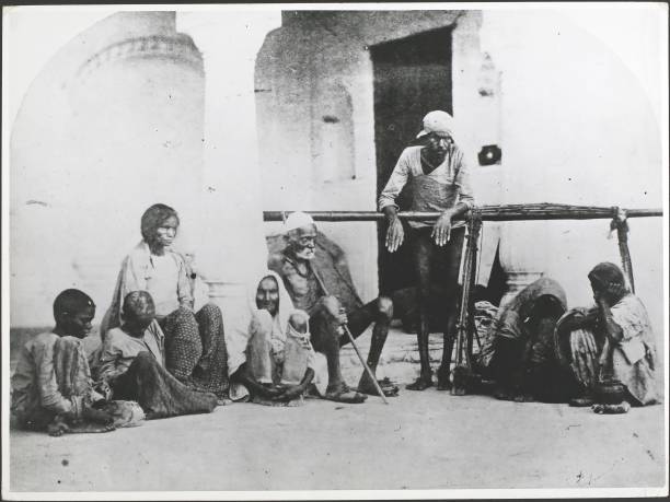 Famine-stricken group in Delhi, India, circa 1868.