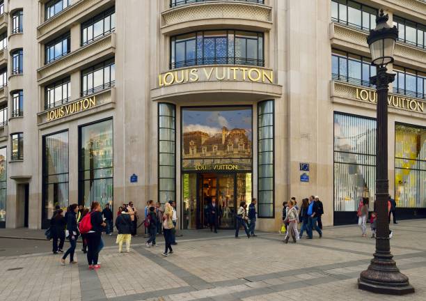 Famous luxurious shop Louis Vuitton on Champs Elysees strett, Paris, France.