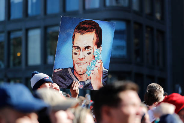 Fan representation   of New England Patriots backmost   Tom Brady and his 6 rings during the New England Patriots Super Bowl Victory Parade connected  February 5....
