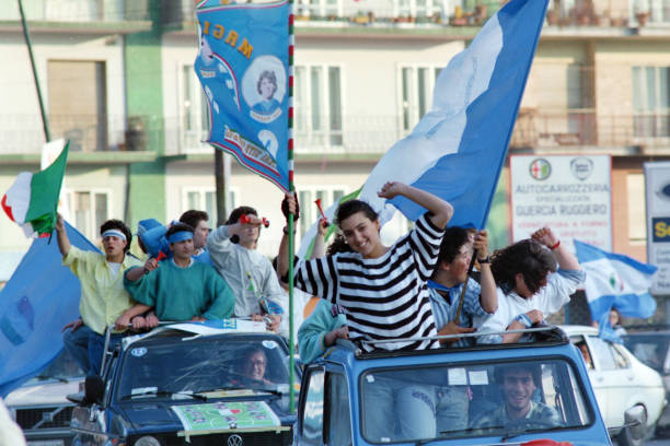 Fans celebrate Napoli's season champions after the Serie A match between Napoli and Fiorentina on May 10, 1987 in Naples, Italy.