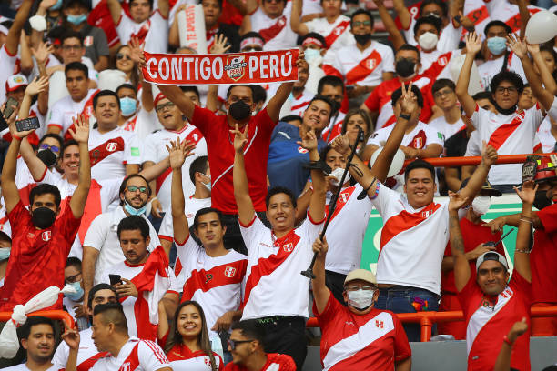 Fans of Peru cheer on their team during the FIFA World Cup Qatar 2022 qualification match between Peru and Paraguay at Estadio Nacional de Lima on...