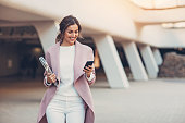 Fashionable woman with smart phone