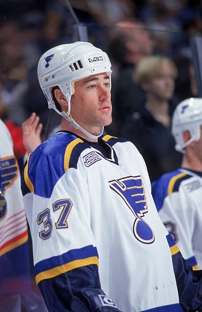 feb-2000-jeff-finley-of-the-st-louis-blues-looks-on-the-ice-during-a-picture-id72327238