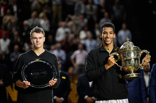 Felix Auger-Aliassime of Canada and Holger Rune of Denmark pose after their final match during day nine of the Swiss Indoor Basel at St. Jakobshalle...
