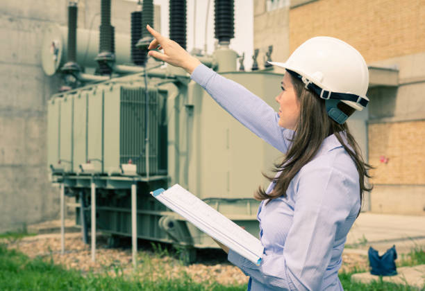 female engineer is checking equipment in power substation picture
