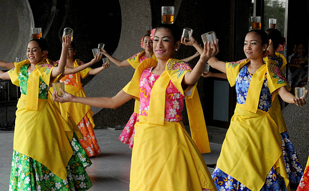 Filipino Dancers Perform The Binasuan A Dance Using