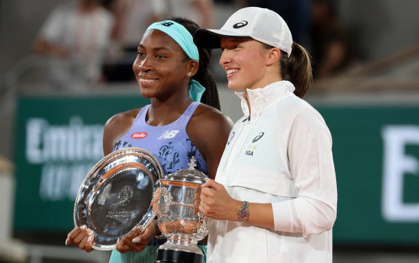 Finalist Coco Gauff of USA, winner Iga Swiatek of Poland during the trophy ceremony of the women's final on day 14 of the French Open 2022, second...