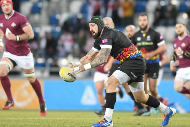 TBILISI, GEORGIA - FEBRUARY 01: Florian Vlaicu of Romania passes the ball during the Rugby Europe International Championship round one match between Georggia and Romania at Dinamo Arena on February 1, 2020 in Tbilisi, Georgia. (Photo by Levan Verdzeuli/Getty Images)