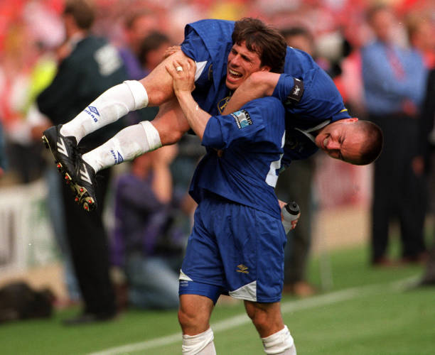 Football, 1997 FA Cup Final, Wembley, 17th May Chelsea 2 v Middlesbrough 0, Chelsea's Gianfranco Zola lifts captain Dennis Wise over his shoulder as...
